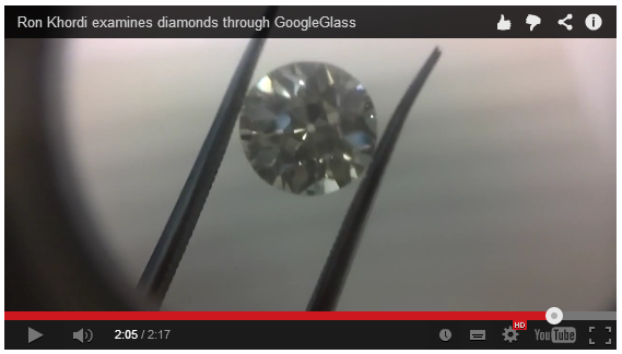 Video Screenshot Showing The Inspection Of Solitaire Diamond Using Glass