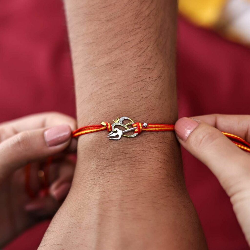 Om Trishul Rakhi Pendant Om Trishul Rakhi Pendant