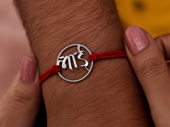 भाई Bhai Silver Rakhi Brooch on wrist