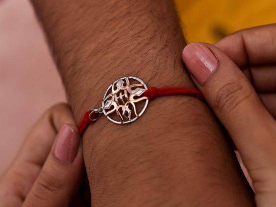 Shiva Silver Rakhi Pendant on wrist