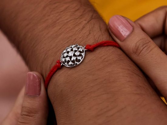 Sayukta Silver Rakhi on wrist