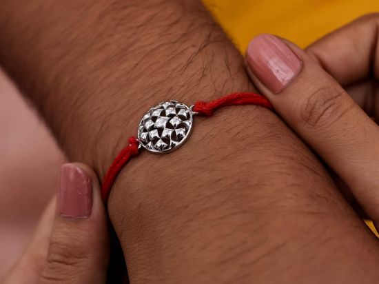 Sayukta Silver Rakhi on wrist